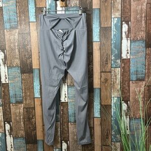 Large gray bow tie behind high rise leggings